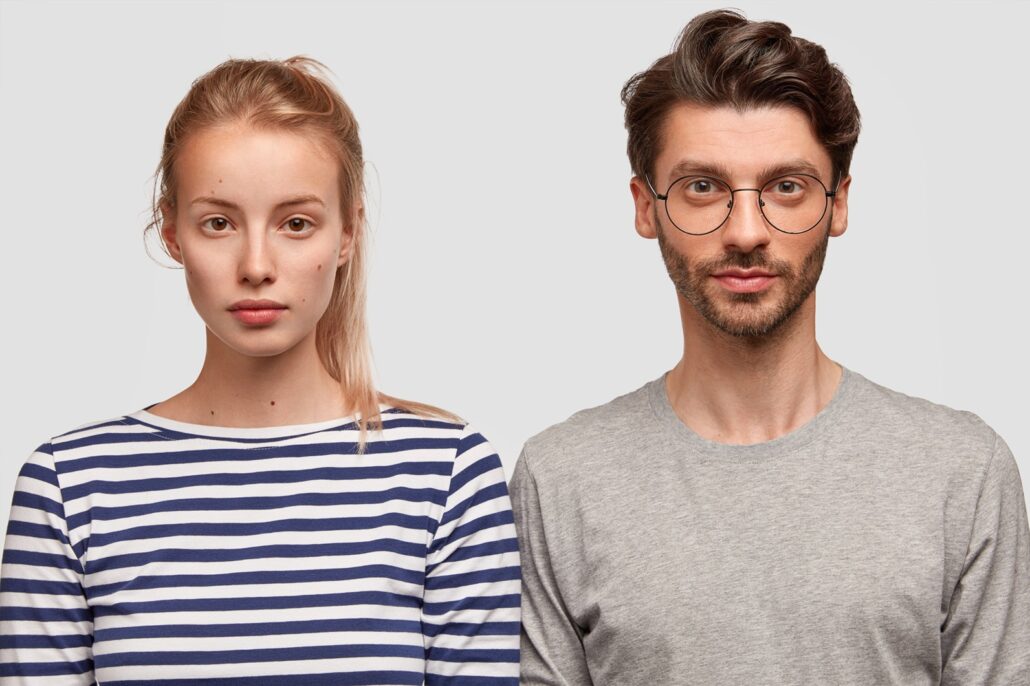 Man and woman side by side in an article on eating disorder facts for 2024.