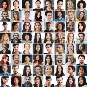 Picture of many people smiling in an article on eating disorder facts.